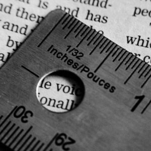 A ruler measuring text on a page