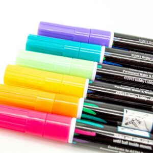 A set of multicoloured pens on a white background