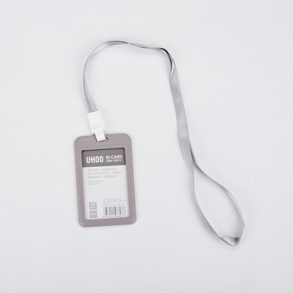 An ID card holder attached to a lanyard