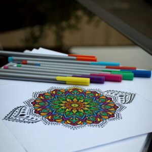 Colouring book with markers and pencils