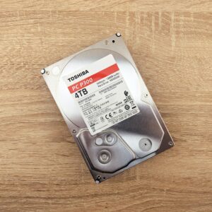A portable hard drive on a wooden table