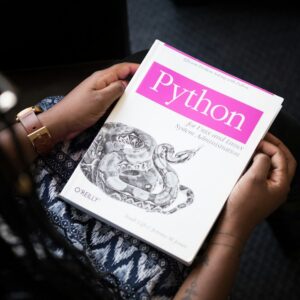 A shallow-focus photo of a Python programming book