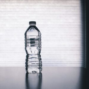 Clear drinking bottle filled with water