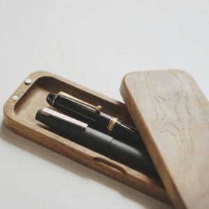 Two pens in a wooden presentation box