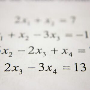 A system of linear equations printed in black ink on white paper
